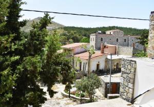 a view of a village from the roof of a house at Ethia 2Floor Mountain View Cottage garden wifi ac in Ethiá