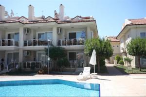 Bazén v ubytování SUNSET BEACH CLUB LEBRENTALS nebo v jeho okolí