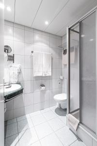 Koupelna v ubytování Hotel Münchwilen