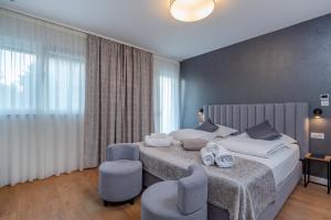 Postel nebo postele na pokoji v ubytování Seven Seas Residence