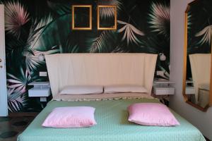 A bed or beds in a room at Lion Luxury rooms