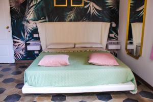 A bed or beds in a room at Lion Luxury rooms