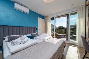 Postel nebo postele na pokoji v ubytování Seven Seas Residence