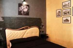 A bed or beds in a room at Lion Luxury rooms
