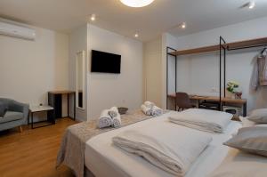 Postel nebo postele na pokoji v ubytování Seven Seas Residence
