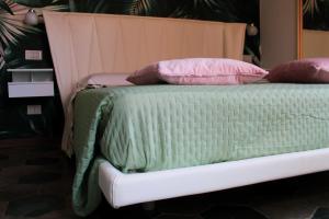 A bed or beds in a room at Lion Luxury rooms