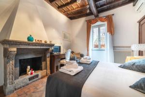 Postel nebo postele na pokoji v ubytování Luxury Trastevere