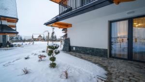 Resorts E Białka Tatrzańska z sauną, Sun & Snow v zime
