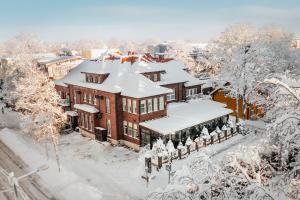 an aerial view of a building covered in snow at Hotel Villa Wesset in Pärnu
