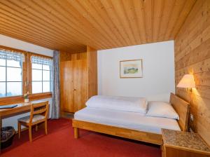 Postel nebo postele na pokoji v ubytování Hotel und Restaurant Chäseren