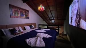 Cama ou camas em um quarto em Hotel La Serena