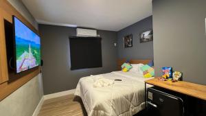 Cama ou camas em um quarto em Hotel La Serena