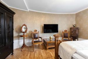 TV a/nebo společenská místnost v ubytování Best Western Vetlanda Stadshotell