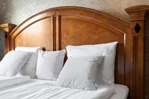 Postel nebo postele na pokoji v ubytování Best Western Vetlanda Stadshotell