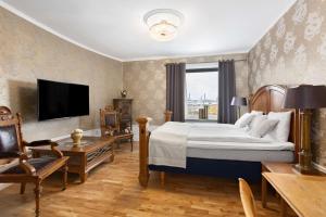 TV a/nebo společenská místnost v ubytování Best Western Vetlanda Stadshotell