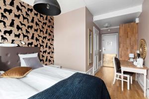 Postel nebo postele na pokoji v ubytování Best Western Vetlanda Stadshotell