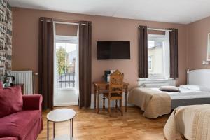 Postel nebo postele na pokoji v ubytování Best Western Vetlanda Stadshotell
