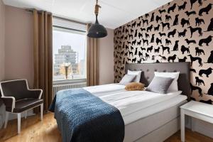 Postel nebo postele na pokoji v ubytování Best Western Vetlanda Stadshotell