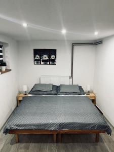 Posteľ alebo postele v izbe v ubytovaní Apartmán u Martuly