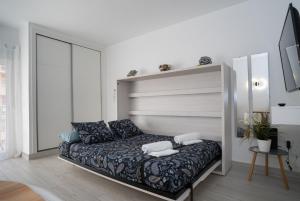 Posteľ alebo postele v izbe v ubytovaní IMPECABLE ESTUDIO CON PARQUE ACUATICO + 33 fotografií