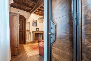 a door leading into a room with a living room at Luxury Trastevere in Rome