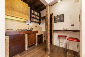 Kuchyň nebo kuchyňský kout v ubytování Luxury Trastevere