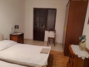Postel nebo postele na pokoji v ubytování AMMA rooms
