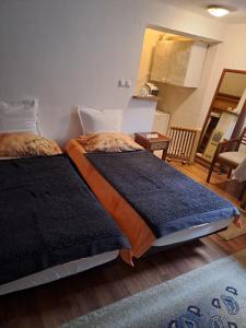 Postel nebo postele na pokoji v ubytování AMMA rooms