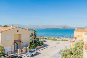 a view of the ocean from a house at Sa Marina in Alcudia
