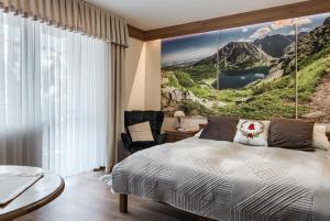 Posteľ alebo postele v izbe v ubytovaní Willa Kocham Tatry