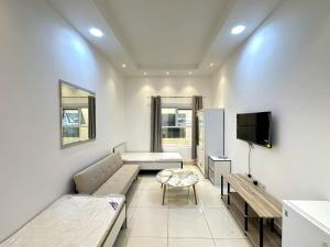 TV a/nebo společenská místnost v ubytování Economical Rooms for rent in Dubai