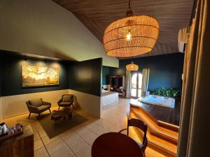 Uma área de estar em Tenondé Park Hotel