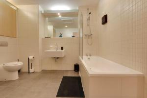 a bathroom with a toilet and a sink and a shower at Home Away From Home - Contractors & Leisure in Sheffield