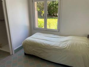 Posteľ alebo postele v izbe v ubytovaní Le colombier, villa vue mer accès plage 300M