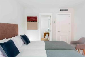 Postel nebo postele na pokoji v ubytování Apartamento LP RENTAL HOME MAGDALENA