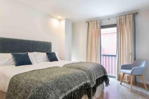 Postel nebo postele na pokoji v ubytování Apartamento LP RENTAL HOME MAGDALENA
