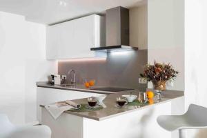 Kuchyň nebo kuchyňský kout v ubytování Apartamento LP RENTAL HOME MAGDALENA
