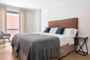 Postel nebo postele na pokoji v ubytování Apartamento LP RENTAL HOME MAGDALENA