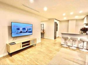 TV a/nebo společenská místnost v ubytování Apartamento LP RENTAL HOME MAGDALENA