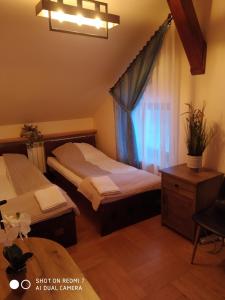 Ένα ή περισσότερα κρεβάτια σε δωμάτιο στο Hostel LUNA