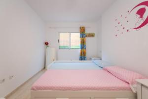Posteľ alebo postele v izbe v ubytovaní Casa Angel A 3