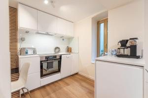 Kuchyň nebo kuchyňský kout v ubytování Ostseevilla - Appartement 05 + 8 fotografií