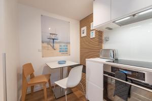 Kuchyň nebo kuchyňský kout v ubytování Ostseevilla - Appartement 05