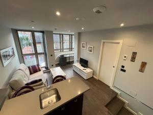 A seating area at Apartamento - Riba De Sella