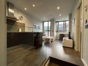 A television and/or entertainment centre at Apartamento - Riba De Sella