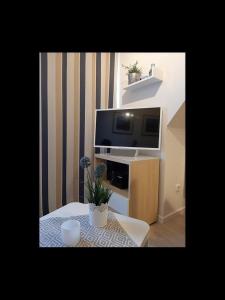 TV a/nebo společenská místnost v ubytování Amrum-Time