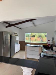 Kjøkken eller kjøkkenkrok på Casa de Praia - Interlagos