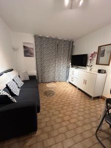 Posteľ alebo postele v izbe v ubytovaní T2 à côté de la mer quartier des Quilles