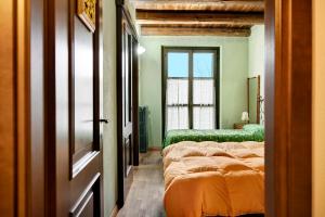 Posteľ alebo postele v izbe v ubytovaní Casa Vacanze il Ginepro