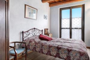 Posteľ alebo postele v izbe v ubytovaní Casa Vacanze il Ginepro